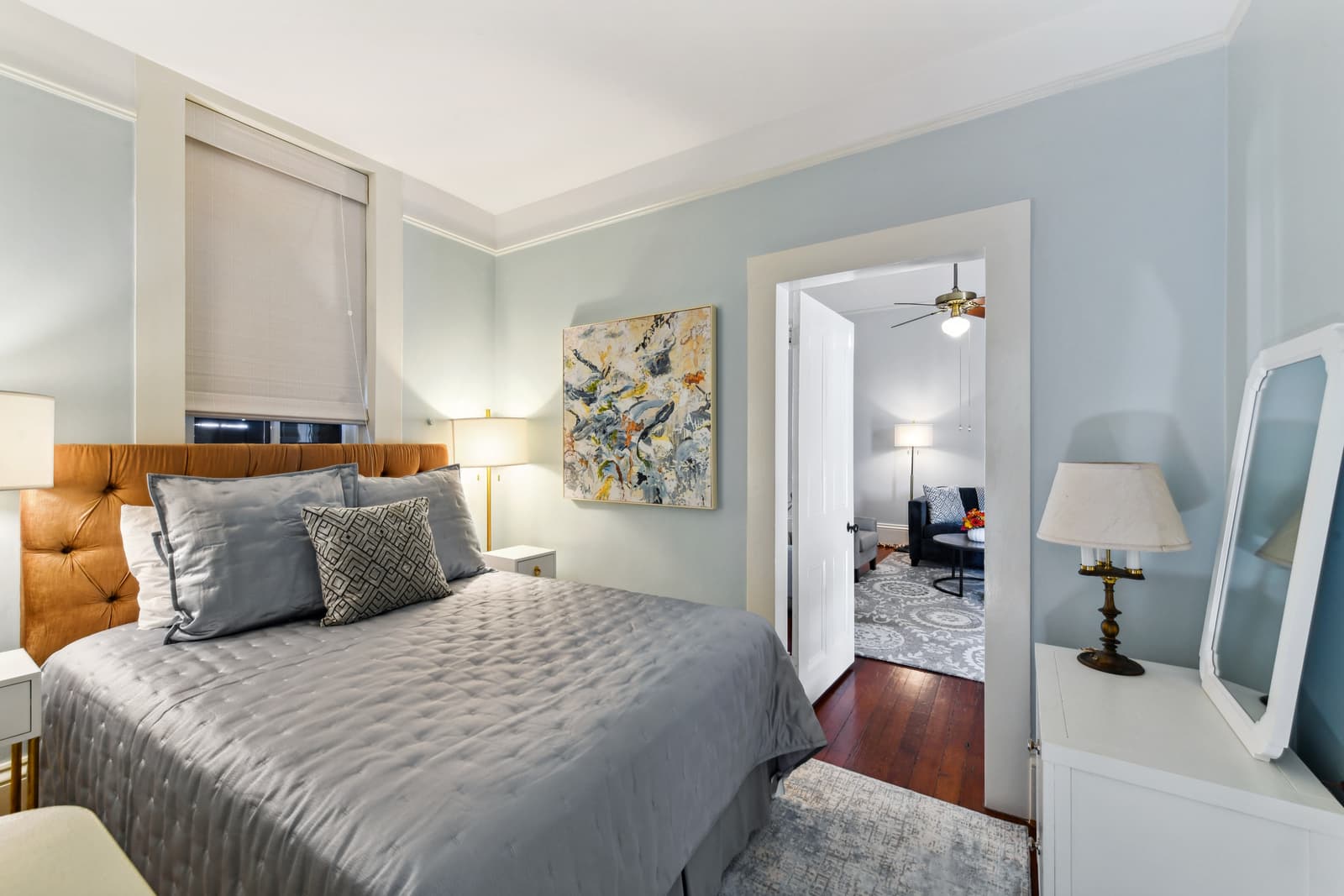 Beth's Balcony Escape is Queen bedded with an adjoining living room with an additional pull-out queen bed, a luxury full-sized bathtub and shower, and kitchenette